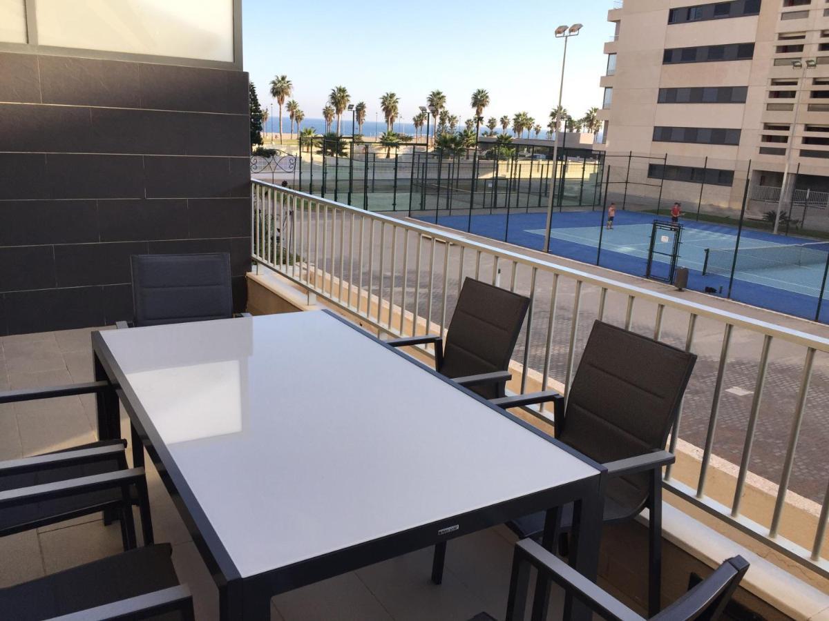 Apartamento Lujo, Primera linea playa, Garaje, Wifi, Piscina climatizada Roquetas de Mar Esterno foto
